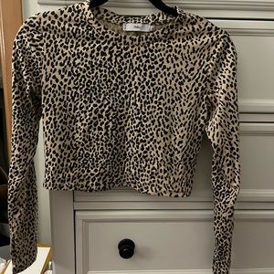 Slightly cropped Adika long sleeve cheetah top